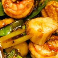 Shrimp And Scallops In Garlic Sauce 鱼香干贝虾 · Jumbo shrimp and scallops stir fried with broccoli, celery, green peppers, red peppers, wate...