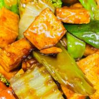 House Style Tofu 家常豆腐 · Tofu lightly fried, then stir-fried with broccoli, napa cabbage, mushrooms, peapods, baby co...