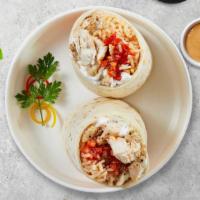 Cheeky Chicken Burrito · Grilled chicken topped with sour cream salsa cheese and refried beans wrapped in a warm tort...