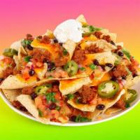 Lock & Loaded Nachos · Warm nachos topped with cheese, chili meat sauce, tomatoes, jalapeños, and sour cream.
