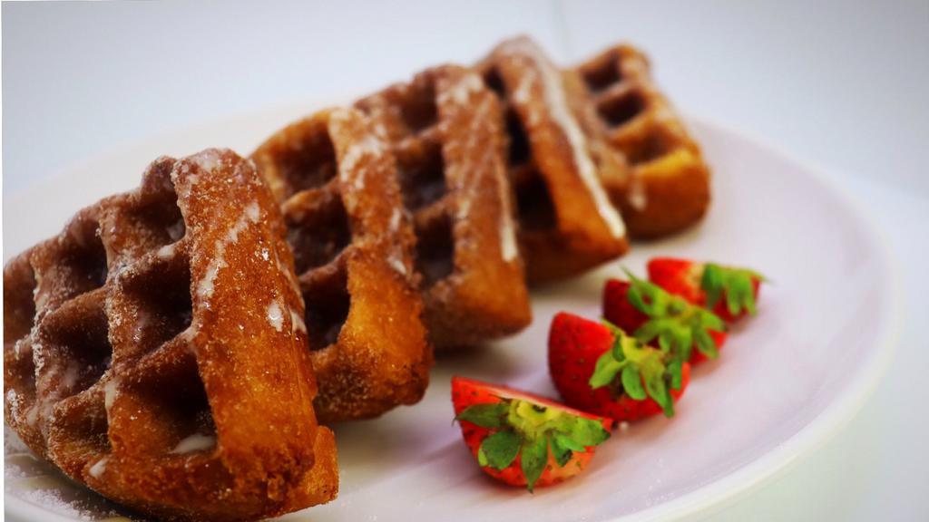 Traditional Waffle · Fried waffle topped with powdered sugar.