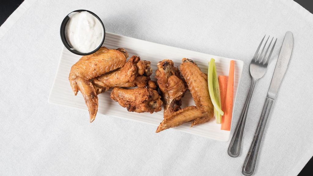 Wings · Naked wings tossed in any of our signature sauces of your choice, served with celery and carrots along with your choice of ranch or Bleu cheese dipping sauce.