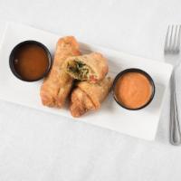 Homemade Egg Rolls · Homemade egg rolls with any protein of your choice, seasoned rice, American cheese served wi...
