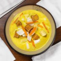 Yellow Curry · Sweet potato cooked in coconut milk and yellow curry paste.