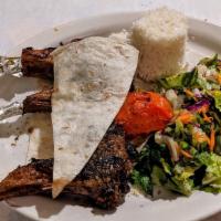 Lamb Chops · Grilled lamb chops with grilled red and green bell peppers and served with Turkish rice and ...