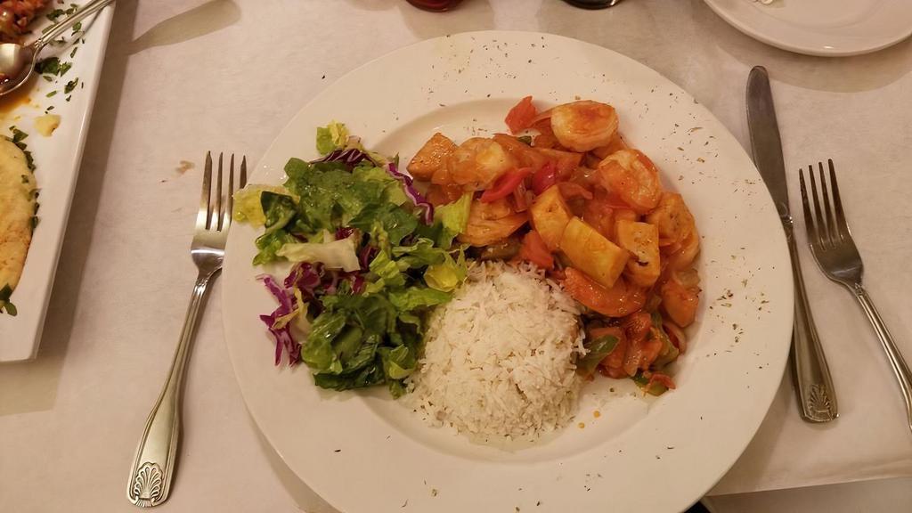 Shrimp Mediterranean · Shrimp sauteed with tomato sauce, green peppers, tomatoes, onions and potatoes.