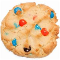 Magical M&M Cookie · Refined sweetness in the peaks and valleys of this hand-pressed cookie just beg for a party ...