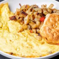 Veggie Omelet · Sautéed onions, bell peppers, & cheese, side of tater tots, & a biscuit/toast.