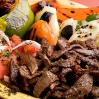 Full Beef Shawarma · Extra lean beef marinated with Mr. Kabob’s recipe slow roasted on a vertical skewer. Cooked ...