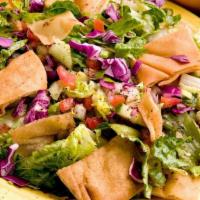 Sm Fattoush · Vegetarian. Lettuce, tomato, onion, cucumber, parsley, imported sumac tossed with fried pita...