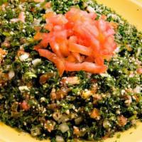 Lg Tabbouli · Vegetarian. A mixture of chopped parsley, onion, tomato, cracked wheat, tossed with extra vi...