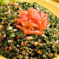 Md Tabbouli · Vegetarian. A mixture of chopped parsley, onion, tomato, cracked wheat, tossed with extra vi...