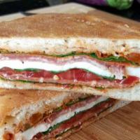 Salami Sandwich · Includes lettuce, tomato, onion, mayo and mustard.