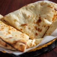 Naan · Recommended. A leavened, oven-baked ﬂatbread.