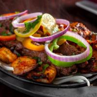 Tandoor Mix Grill Platter · Recommended. A house specialty. This adventurous combination platter allows you to sample ou...