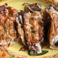 3 Julio Taco Dinner · 3 Julios Tacos (grilled ribeye, grilled onion and jalapeño, melted cheese) served with rice ...