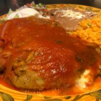 2 Chiles Rellenos Dinner · 2 poblano peppers stuffed with melted cheese, fried in egg batter and topped with ranchero s...