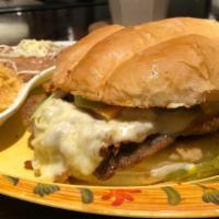 Torta Milanesa De Res - Breaded Ribeye Steak Sandwich · Thinly sliced breaded ribeye grilled with jalapeño and onion topped with cheese, lettuce, to...