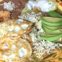 Chilaquiles · Red or green sauce with 2 eggs any style topped with sour cream.