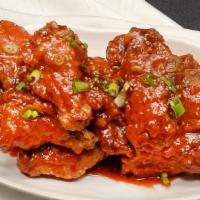 Yang Nyum Chicken · Fried sweet and spicy chicken Korean spicy deep fried chicken.