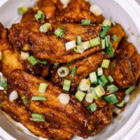 Szechuan Chicken Wings (8) · Hot & spicy.