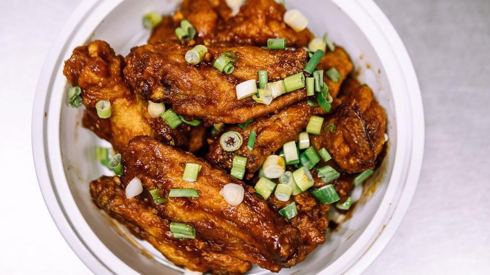 Szechuan Chicken Wings (8) · Hot & spicy.