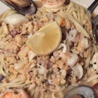 Seafood Pescatore · Shrimp, mussels, calamari & clams over linguini pasta served w/ white wine sauce or red sauce.