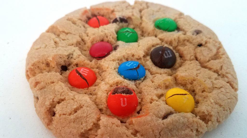 Chocolate Chip M&M · Crispy edges, chewy middle, lots of chocolate chips.....topped with colourful M&M candies.
