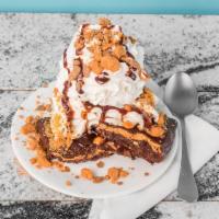 Peanut Butter Brownie Sundae · Our peanut butter brownie warmed up with vanilla soft serve on top, then topped with Butterf...