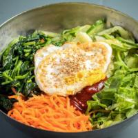 Bi-Bim-Bap · White rice topped with sautted vegetables with sweet and spicy sauce.