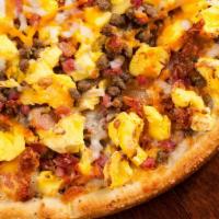 Omelet Pizzas · Pan-style crust with scrambled eggs, cheese, and your favorite pizza toppings. Denver: Green...