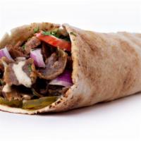 Beef Shawarma Pita · Mouthwatering beef shawarma made artfully in a pita with lettuce, tomatoes, onions, cucumber...