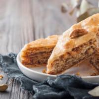 Baklava · Traditional dessert made with layered nuts and sweet honey.