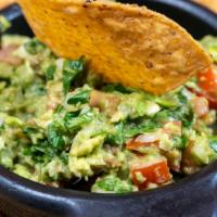 Guacamole · Freshly made and served with chips.
