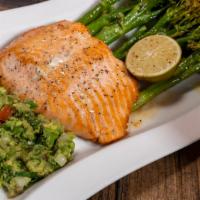 Lime Seared Salmon · Fresh grilled salmon, served with asparagus and corn salad.