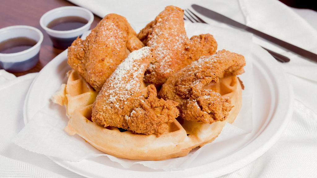 Chicken And Waffles · Four whole wings with Belgian waffle.