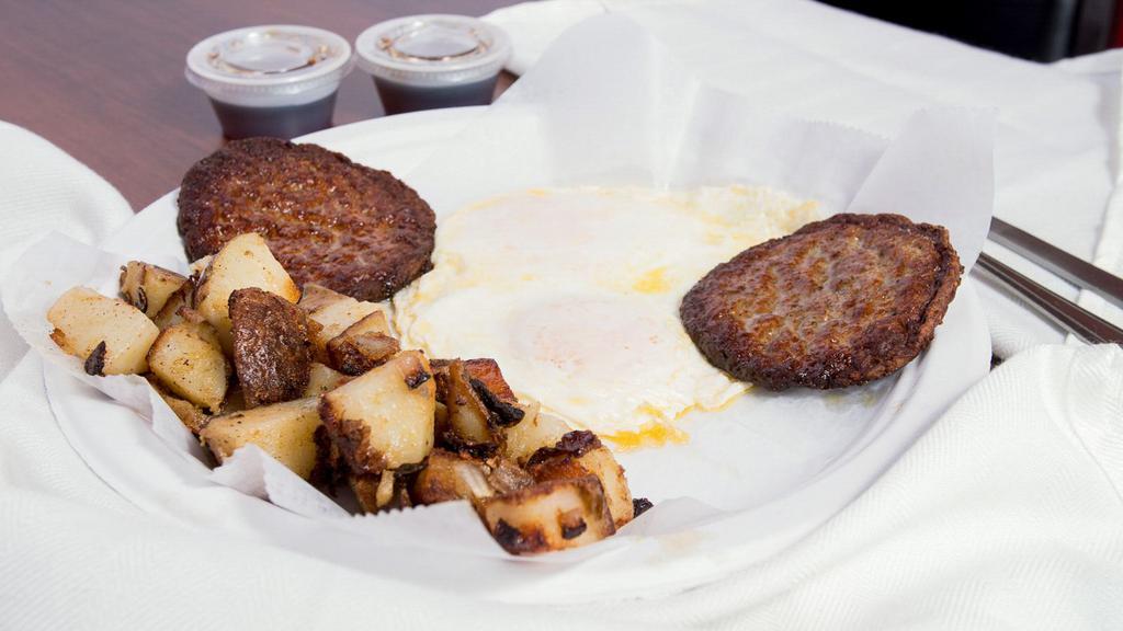 Waffle Breakfast · 2 eggs, meat, grits or fried potatoes.