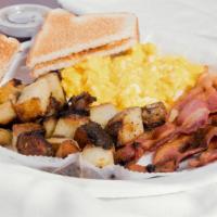 House Special Breakfast · 2 eggs, meat, toast, grits or fried potatoes.