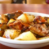 Home Potatoes · Diced up chunks of potatoes. Seasoned and cooked on the grill.