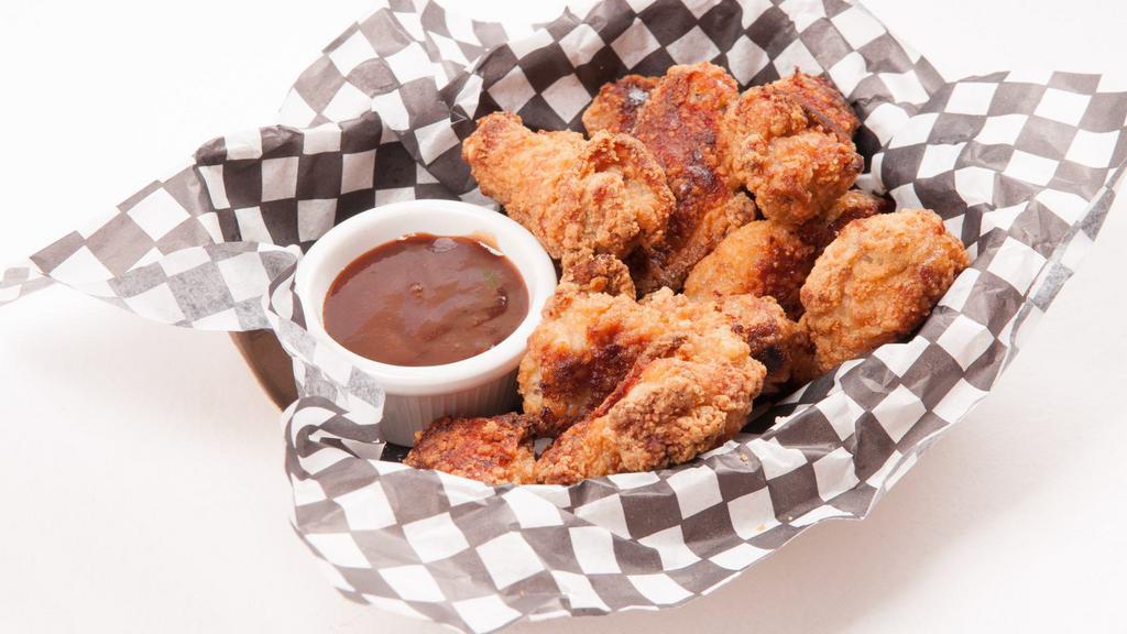 Bbq Chicken Wings  · Oven-baked chicken wings crispy to perfection topped with sweet BBQ sauce. Served with Ranch.