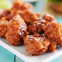 Boneless Honey Mustard Wings · Boneless! Oven-baked chicken wings crispy to perfection topped with sweet honey mustard sauc...