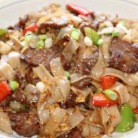 Pad Kee Meow · Hot. Flat big rice noodle with a choice of meat, egg. Fresh garlic, green and red bell peppe...