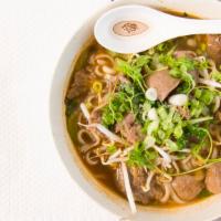 Beef Noodle Soup · Rice noodle with sliced beef and beef meatball in beef broth.