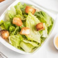 Chicken Caesar Salad · Romaine, shredded Parmesan, grilled chicken and croutons.