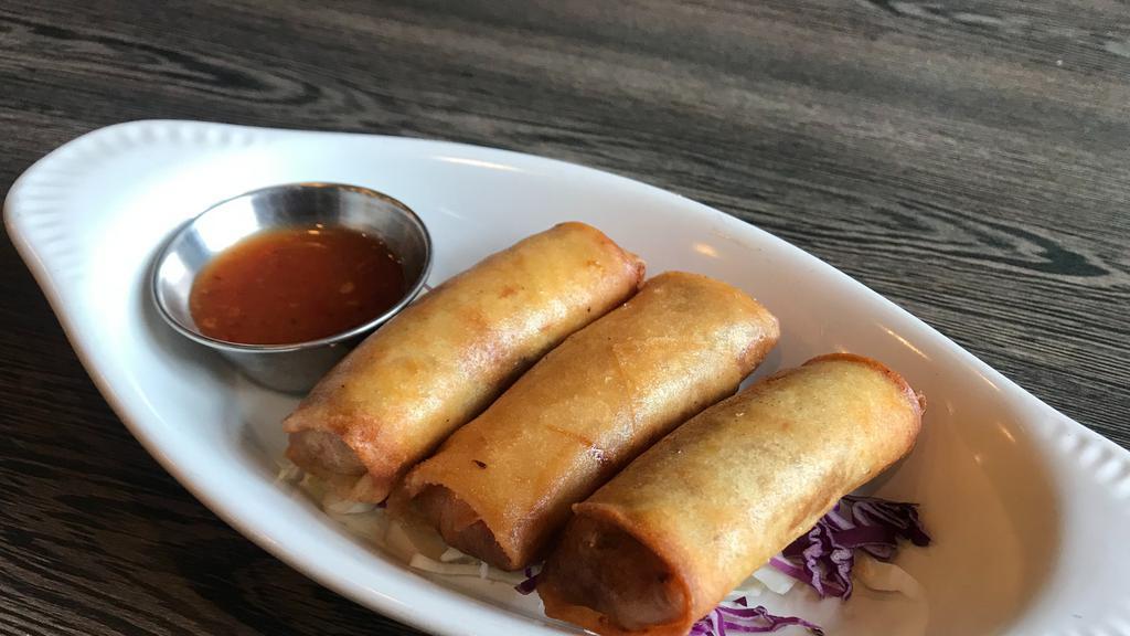 Thai Spring Roll · Hand-roll with cabbage, silk noodles, carrot, Thai sweet chili dipping sauce.