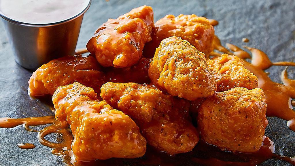 1/2 Lb. Of Boneless Wings · 1/2 lb. of boneless wings and choice of 1 dipping sauce.