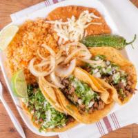 Tacos · Choice of corn, flour or handmade corn tortillas. American style: cheese, lettuce, and tomat...