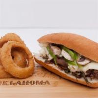 Philly Cheese Steak Sandwich Combo · With onions, bell peppers, mushrooms & Swiss cheese.