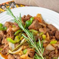 Well Done Tebes · Injer bread, cubed beef and well done sauteed with onions, garlic, tomatoes, sliced jalapeño...