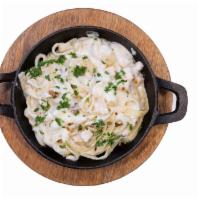 Chicken Fettuccine Alfredo Pasta · Our creamy alfredo sauce tossed with a fettuccine noodle, chicken breast, and topped with fr...